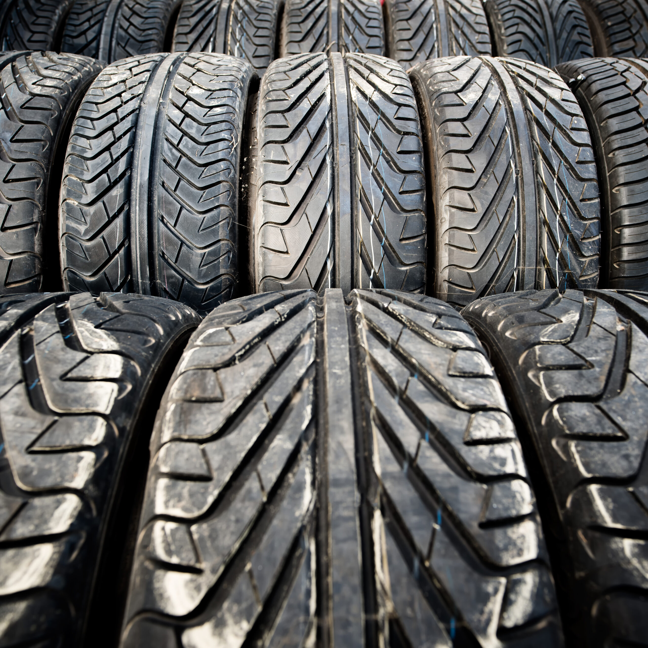 Used old car tires detail pattern, background or texture